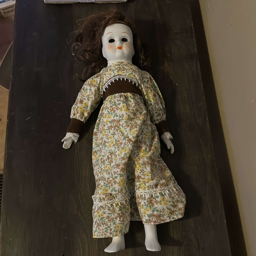 Porcelain doll without eyes